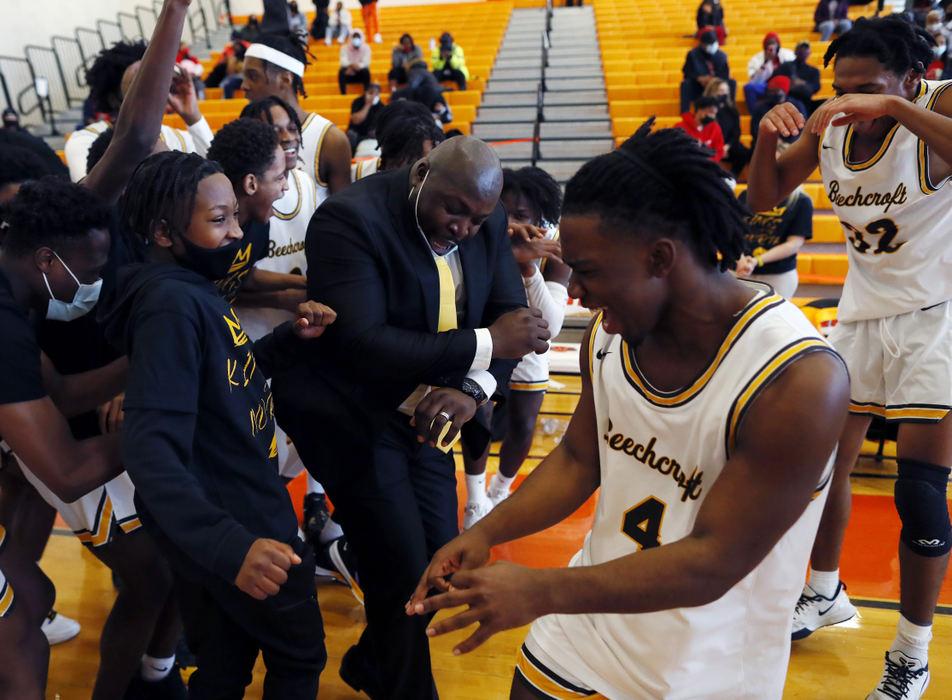 Story -  3rd place - February -  Beechcroft's head coach Humphrey Simmons celebrates after his team beat Walnut Ridge in the Columbus City League Championship game at East High School. (Kyle Robertson / The Columbus Dispatch)