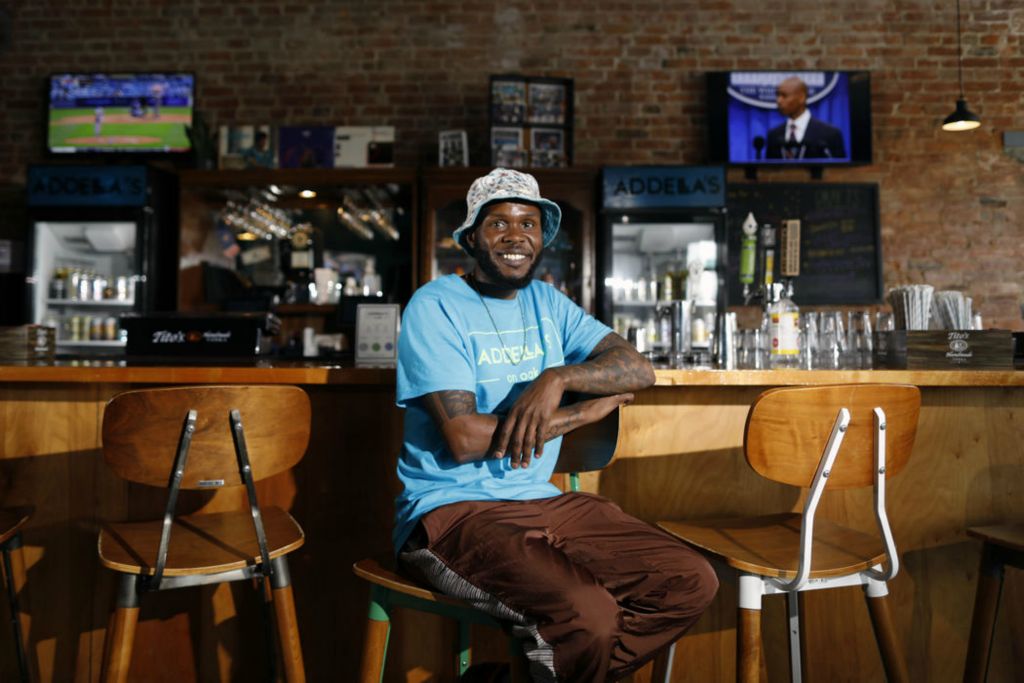 Portrait - HM -  April - Karrio Ballard poses for a photo in his restaurant, Addella's on Oak. Opening a new restaurant during the pandemic has been a struggle.   (Kyle Robertson / The Columbus Dispatch)