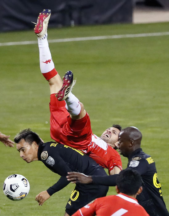 Sports - 2nd place -  April - Columbus Crew SC midfielder Lucas Zelarayan (10) fouls  Real Estelí FC defender Bronzatti (15) during the second half of their CONCACAF Champions League quarterfinals game at Crew Stadium. (Kyle Robertson / The Columbus Dispatch)