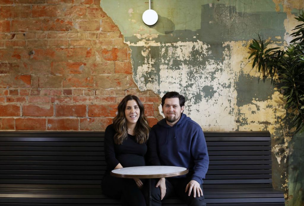 Portrait - 2nd place - October - The owners of Fox in the Snow, Lauren Culley and Jeff Excell, are opening up a sandwich shop called Icarus. The two poses for a photo inside the shop. (Kyle Robertson / The Columbus Dispatch) 
