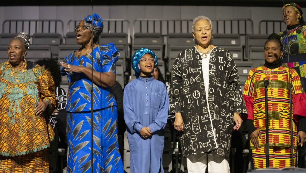 Feature - 2nd place - Esther Owens and other members of NIA Performing Arts sing during the Martin Luther King Jr. Birthday Breakfast at the Greater Columbus Convention Center in Columbus. The Breakfast has been held in Columbus starting in 1986.  (Brooke LaValley / The Columbus Dispatch)