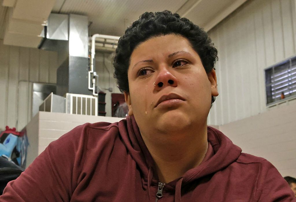 Portrait - 3rd place - A tear runs down the cheek of Tsunami Lopez, 26, as she talks about being homeless in the bitter cold in the Springfield Salvation Army gymnasium. The City of Springfield is partnering with the Salvation Army, Sheltered Inc. and Homefull and has opened an Extreme Cold Weather Homeless Shelter to help those living on the street escape the bitter cold.  (Bill Lackey / Springfield News-Sun)