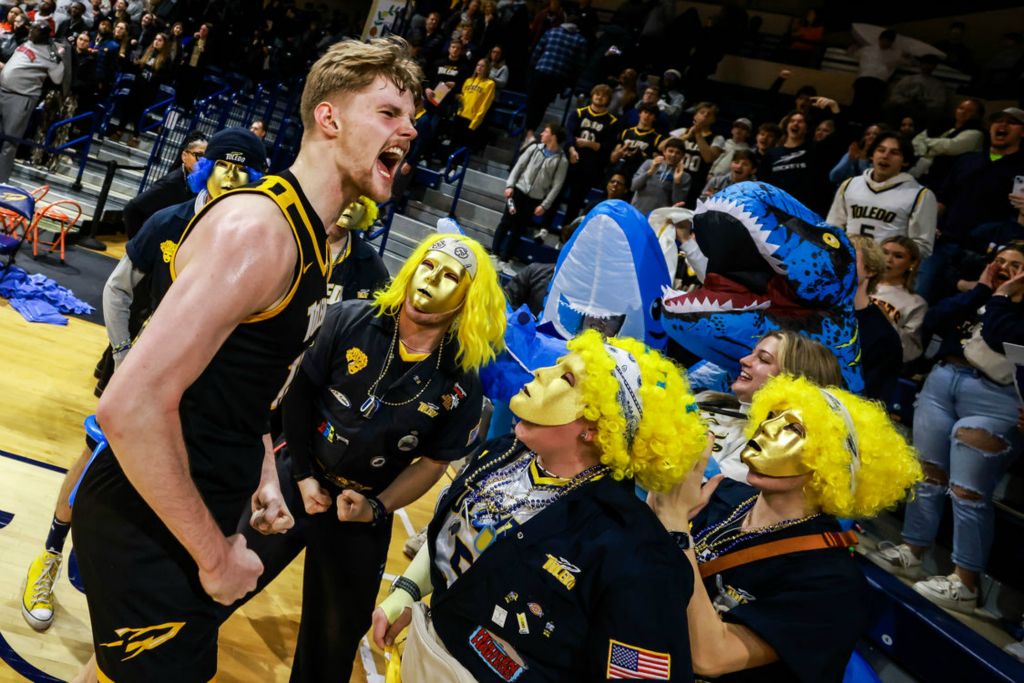 Sports Feature - 1st place - Toledo Rockets forward Andre Lorentsson celebrates with the student section after a win against the Bowling Green Falcons in a MAC conference men’s basketball game on Saturday, Jan. 27, 2024 at Savage Arena in Toledo. (Isaac Ritchey / The Blade)