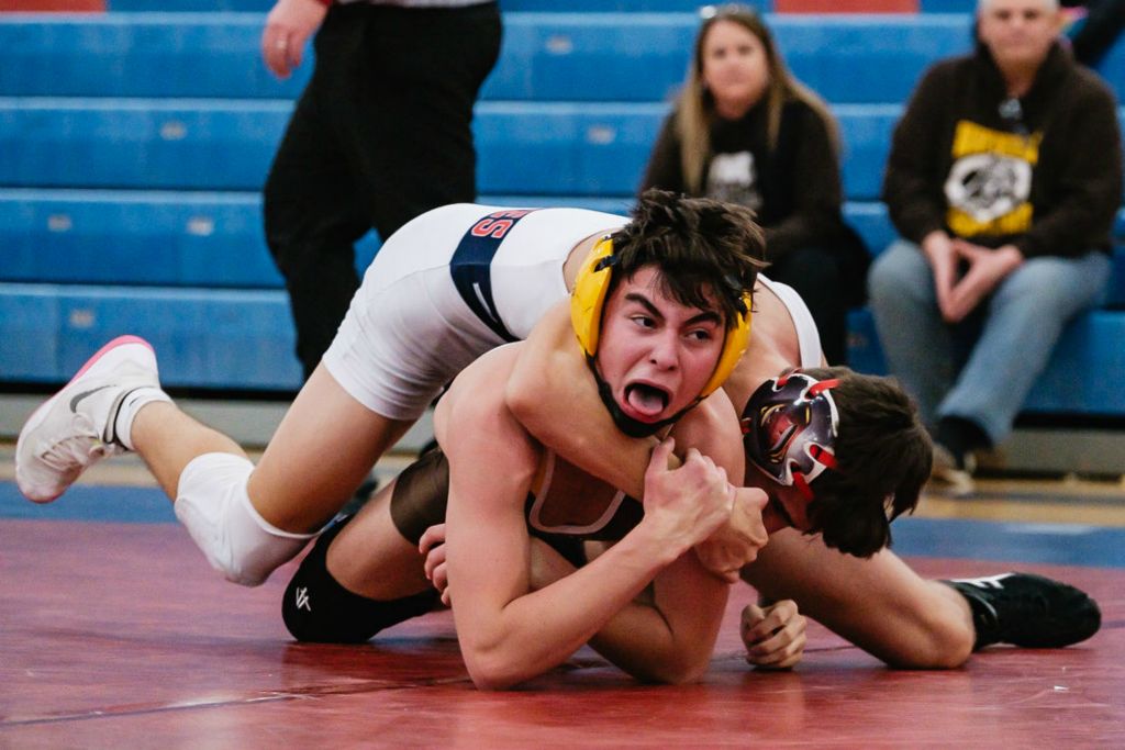 Sports - 3rd place - Waynedale's Dalton Oberly wrestles Indian Valley's Carson Hostetler at Indian Valley High School in Gnadenhutten. (Andrew Dolph / The Times Reporter)