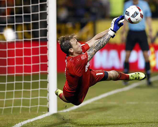 Sports - 2nd place - Columbus Crew SC goalkeeper Steve Clark (1) makes a penalty kick save on Real Salt Lake forward Joao Plata (10) just before halftime to give the Crew SC a 2-1 lead at MAPFRE Stadium in Columbus. (Kyle Robertson / The Columbus Dispatch)