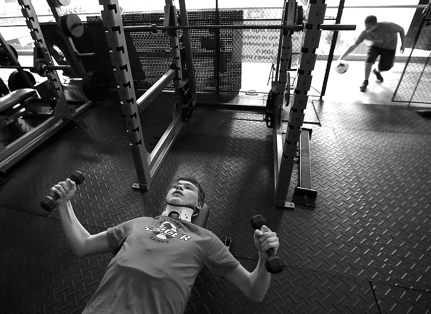 Second Place, Feature Picture Story - Jonathan Quilter / The Columbus DispatchLogan, eager to get back to his former life as a soccer player, does some light weight-lifting with his soccer teammates at West Liberty-Salem High School less than three months after the shooting.