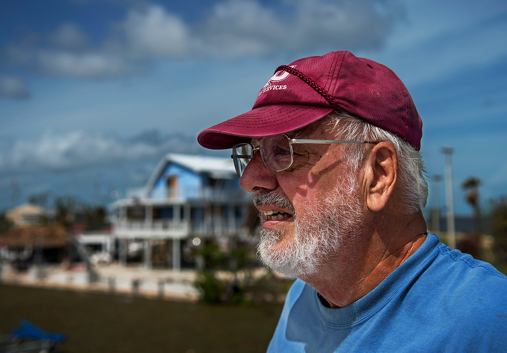 Award of Excellence, News Picture Story - Aaron Self / Kent State UniversityCharlie Chappell is a retiree who lost his home to the destructive force of hurricane Irma. Flood waters ripped out the bottom floor of his house on Big Pine Key and the winds took the top floor walls and ceiling. His roof was found two houses over in a neighbors yard and his boat was ripped of its mooring, overturned one hundred yards away in the canal behind him. Charlie will continue to search the rubble for mementos and anything salvageable until the state tears down what is left of the structure.