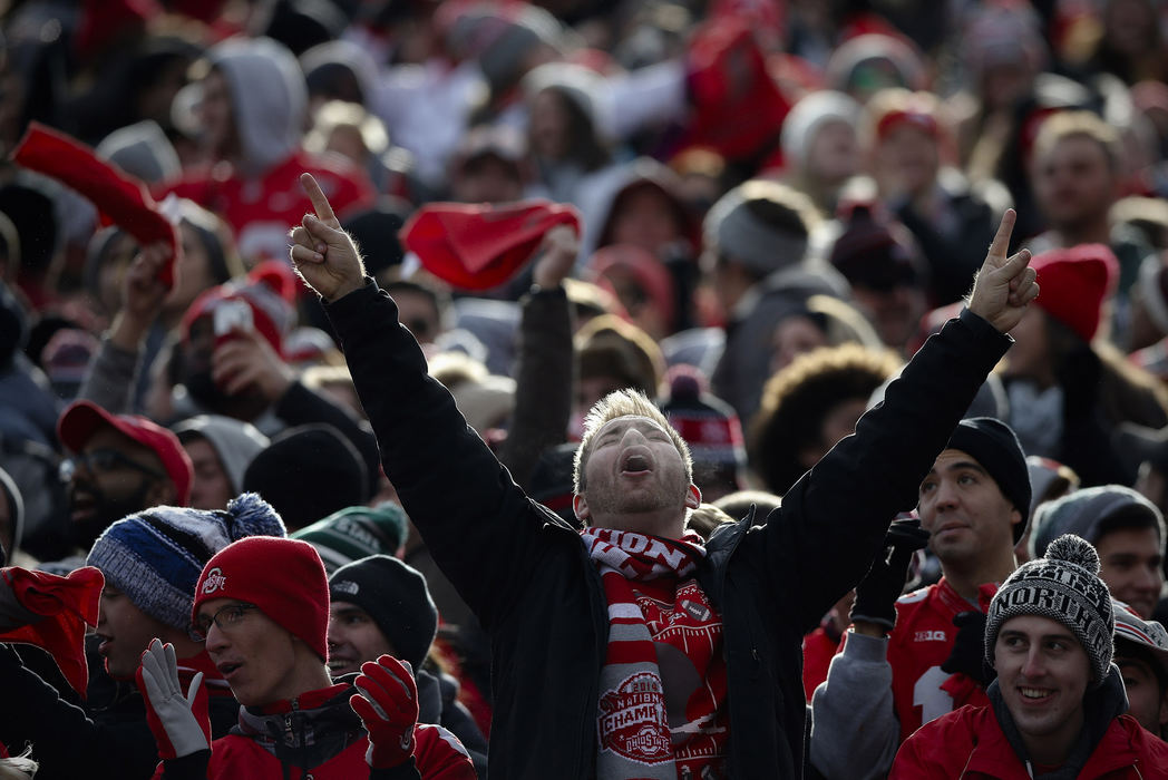 An Ohio State fan celebrates after an 82-yard Mike Weber touchdown during the second quarter of a NCAA college football game between the Ohio State Buckeyes and the Michigan State Spartans on Saturday, November 11, 2017 at Ohio Stadium in Columbus, Ohio.