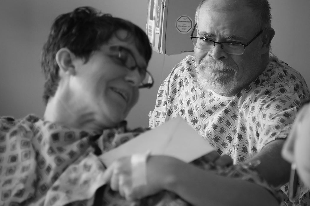 John holds back tears as he hands Ann a thank-you note after meeting her during a meeting with donors and recipients on Thursday, February 16, 2017 at The Ohio State University Wexner Medical Center in Columbus, Ohio. "Thank you, dear. So much," he said, teary-eyed, as they embraced later during their meeting. "May God bless you the rest of your life." Later, he said he was feeling better than he had in years and that his new kidney was already doing its job. "This is my once-in-a-lifetime miracle," John said. "I spoke to my youngest daughter last night, and I said, 'You know, if you didn't believe in miracles before this, you have to now.'"