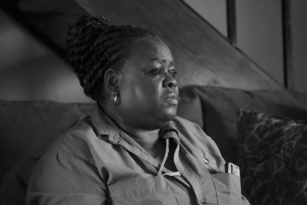 Diane Hudson rests inside her north side townhouse just before leaving to start her 5 p.m. to 1:30 a.m. shift as a janitor for a cleaning company that contracts janitorial services to local businesses. Hudson, who’s worked as a janitor for her company for nine years, makes $10.90 an hour cleaning three buildings at Columbus Academy, a private school in nearby Gahanna, Ohio, where student tuition averages $22,871 a year. She moved to Columbus from Youngstown in search of better job opportunities after losing a good-paying job on an assembly line when the plant in northeast Ohio closed. "This paycheck? It's gone almost as soon as I get it," she said. "The whole reason I left was to better myself, but I have struggled."