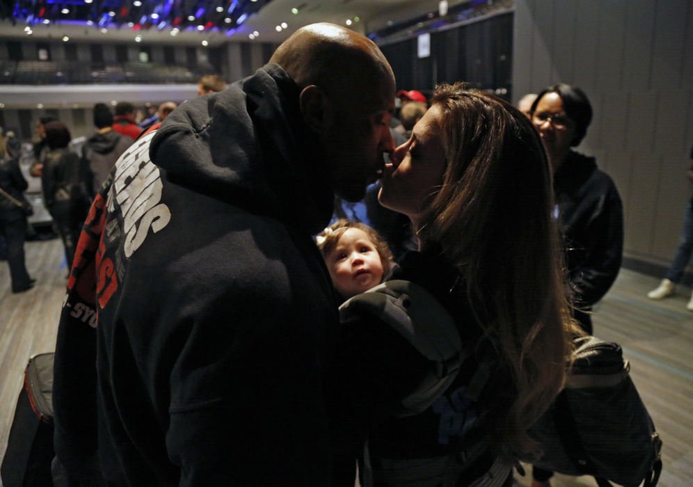 Arnold Classic competitor Juan Morel kisses his wife, Karen, after finishing in 5th place in Arnold Classic final in Columbus, Ohio on March 4, 2017.   Juan placed 6th last year and was happy with his move up this year.  