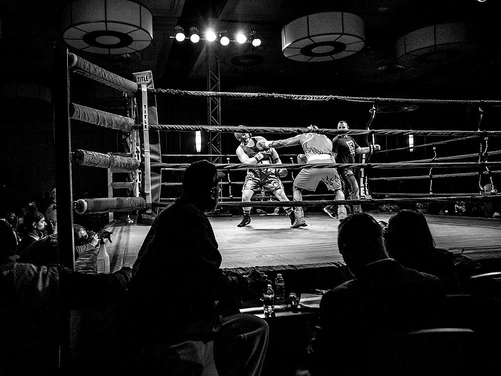 First Place, George S. Smallsreed Photographer of the Year  - Jessica Phelps / Jessica PhelpsThe third annual Guns and Hoses charity boxing match was held at the Hollywood Casino as part of the festivities surrounding the Arnold Fitness Classic. The "Battle of the Bravest" as it is dubbed is all in good fun, pitting police officers against firefighters in ammeter boxing matches. 