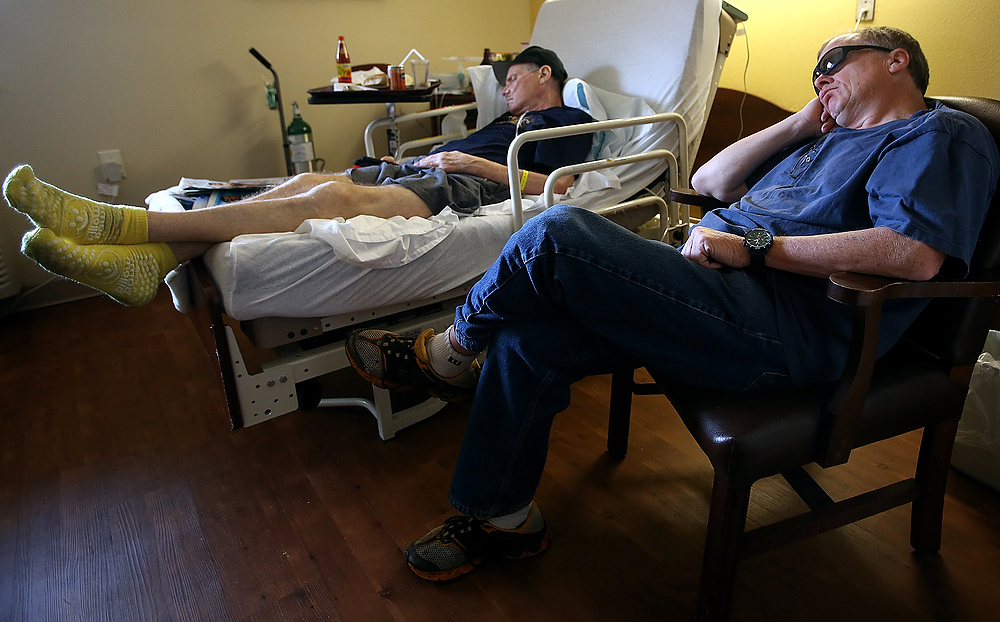 Second Place, George S. Smallsreed Photographer of the Year  - Lorrie Cecil / ThisWeek Community NewsBoth brothers nap during a visit.  Toward the end Mark mostly slept, and long days and trouble sleeping at night left Andy exhausted.