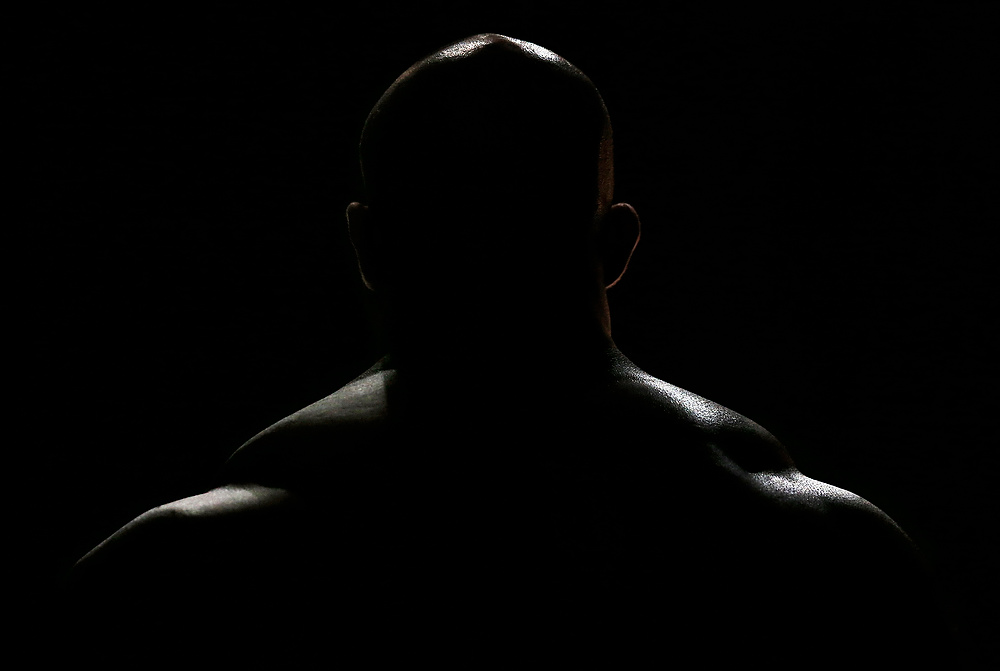 , Ron Kuntz Sports Photographer of the Year - Kyle Robertson / Columbus DispatchIn 2003 at the age of 21-years old Juan Morel went to prison for three years after the death of his five-month old daughter.  After his release Juan dedicated his life to becoming a professional body builder.  Juan never thought he wanted to start another family until he meet his future wife, Karen, a professional body builder, at a competition. Juan and Karen married in 2012 and welcomed their daughter Izabella in 2016.  Juan decided that he needed his wife and daughter at very event that he competes at.  This makes Juan unlike any other professional bodybuilder at the Arnold Classic. Arnold Classic competitor Juan Morel waits to enter the stage before the Arnold Classic  in Columbus, Ohio on March 4, 2017.  
