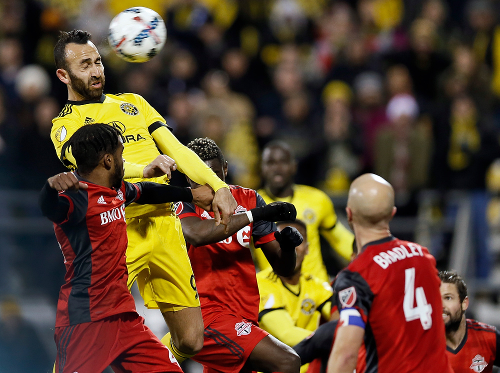 , Ron Kuntz Sports Photographer of the Year - Kyle Robertson / Photo by Kyle RobertsonColumbus Crew SC forward Justin Meram (9) goes up for a header that hit the cross bar against Toronto FC in the 2nd half of the first leg of the MLS Eastern Conference finals at MAPFRE stadium in Columbus, Ohio on November 21, 2017. 