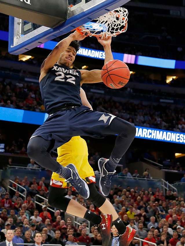 Award of Excellence, Ron Kuntz Sports Photographer of the Year - Sam Greene / The Cincinnati EnquirerXavier Musketeers forward Kaiser Gates (22) throws down a dunk after breaking away down the court in the second half of the NCAA Tournament First Round game between the Maryland Terrapins and the Xavier Musketeers at the Amway Center in Orlando, Fla., on Thursday, March 16, 2017. Xavier pulled ahead for a 76-65 win over Maryland, advancing to the Round of 32.