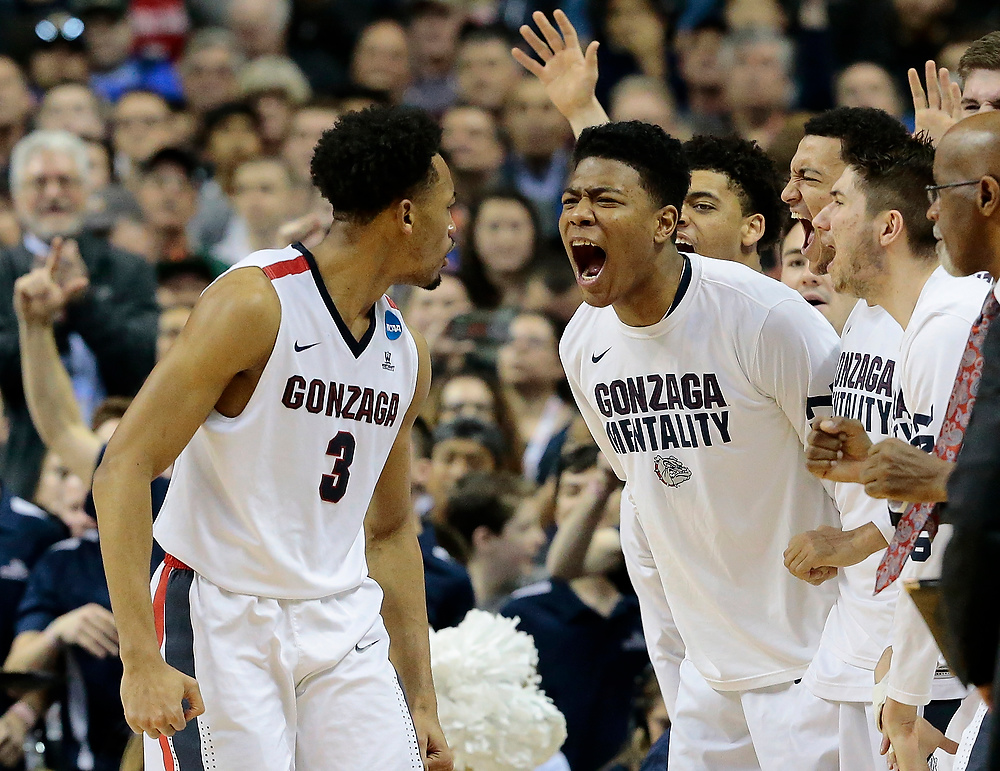 Award of Excellence, Ron Kuntz Sports Photographer of the Year - Sam Greene / The Cincinnati EnquirerGonzaga Bulldogs forward Johnathan Williams (3) and the bench cheer after Williams throws down a dramatic dunk. Gonzaga would eventually advance to the National Title game where they were defeated by North Carolina. 