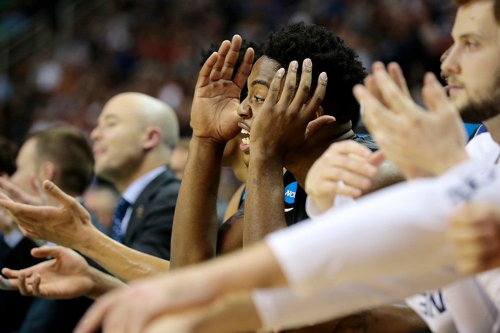 Award of Excellence, Ron Kuntz Sports Photographer of the Year - Sam Greene / The Cincinnati EnquirerXavier Musketeers forward Tyrique Jones (0) shouts for a foul after the Musketeers drive down the court in the second half. Xavier was eliminated from the tournament after an 83-59 loss to the 1-seeded Bulldogs.