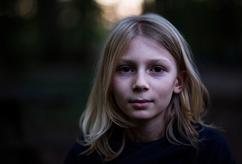 First Place, Chuck Scott Student Photographer of the Year - Erin Clark / Ohio UniversityZadek poses for a portrait in the soft glow of evening light. Zadek is 12-years-old and has spent his entire life living at Twin Oaks.
