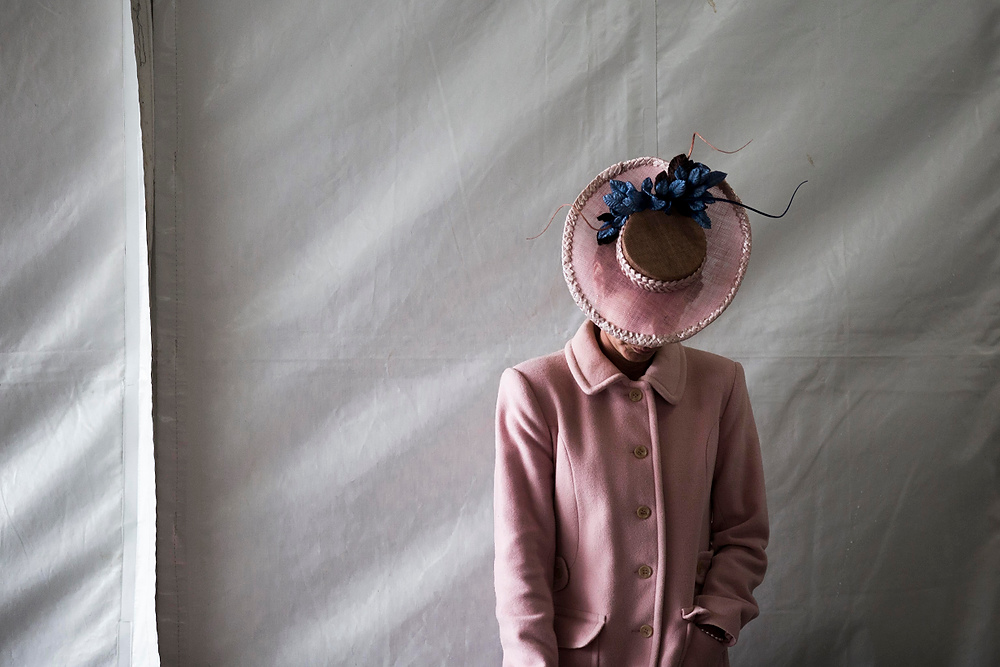 Second Place, Chuck Scott Student Photographer of the Year - Liz Moughon / Ohio UniversityDonna Sloan wears a Sassy Millinery hat from Australia on Kentucky Oaks Day.