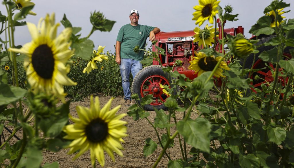 July -  Portrait - 2nd place - Jake Gust, owner of Gust Flower & Produce Farm in Ottawa Lake, Michigan.  (Jeremy Wadsworth / The Blade) 