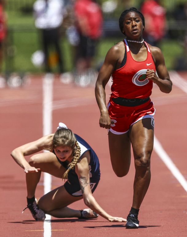 June - Sports - 2nd place - Central Catholic’s Nyla King (right) finishes fourth in the Division II 200 meter dash as Josie Knierim of Morgan falls and breaks her elbow during the OHSAA State Track & Field Meet at Jessie Owens Memorial Stadium in Columbus. (Jeremy Wadsworth / The Blade)