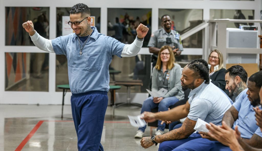 November - General News - HM - Inmate Jorge Reyesavila celebrates earning his Intensive Outpatient certificate during an Education Recognition Ceremony at Toledo Correctional Institution. The ceremony is for incarcerated adults that have successfully completed programs.  (Jeremy Wadsworth / The Blade)