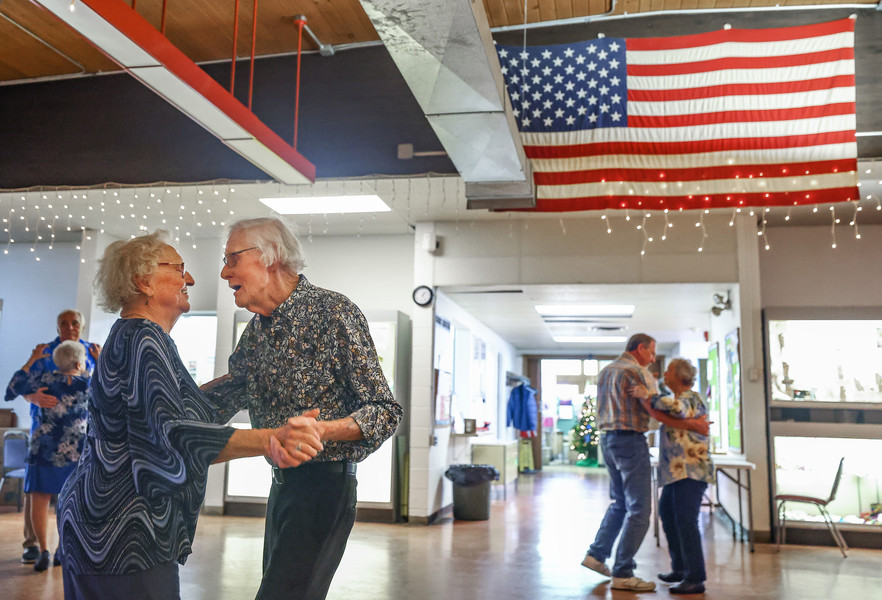May - Feature - 3rd place - Leonore Gaynier, 94, dances with Jim Patton, 85, during the Club K Dance Party at the Eleanor Kahle Senior Center in Toledo.  (Jeremy Wadsworth / The Blade)