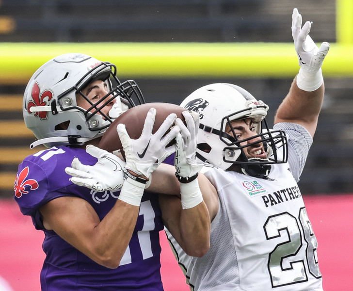 Juy - Sports - 2nd place - Parma Panthers linebacker Marcello Leone (28) breaks up a pass intended for Firenze Guelfi wide receiver Niccolo' Formosa (11) during the Italian Bowl XLII at the Glass Bowl in Toledo.  (Jeremy Wadsworth / The Blade)