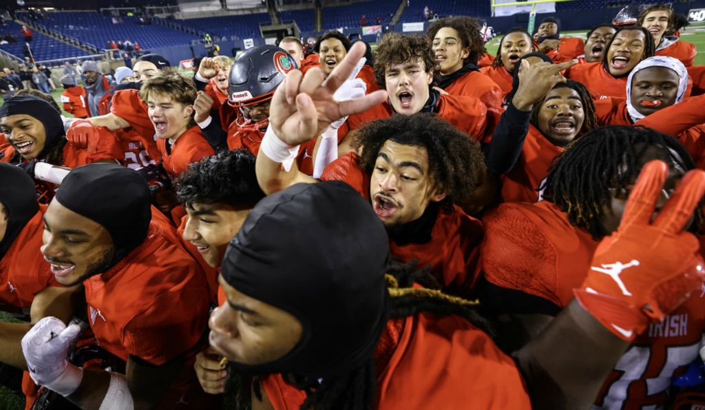 December - Story - 1st place - Central Catholic players celebrate defeating Columbus Bishop Watterson, 27-7, to win the Division III state championship at Tom Benson Hall of Fame Stadium in Canton.  (Jeremy Wadsworth / The Blade)